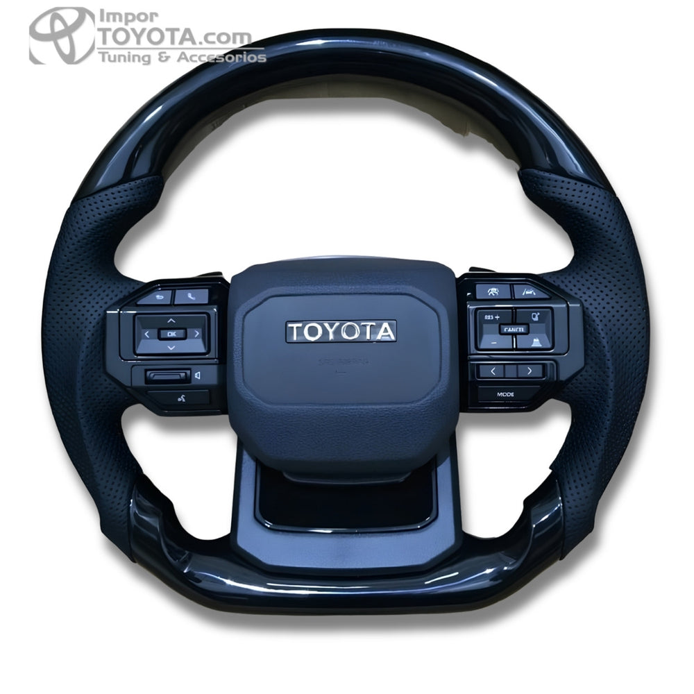 Timón cabrilla tipo GR 2026 para Toyota, negro brillante con cuero perforado - vista frontal - Importoyota Colombia