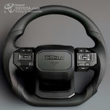 Timón tipo GR 2026 para Toyota en cuero negro con controles multimedia - Importoyota